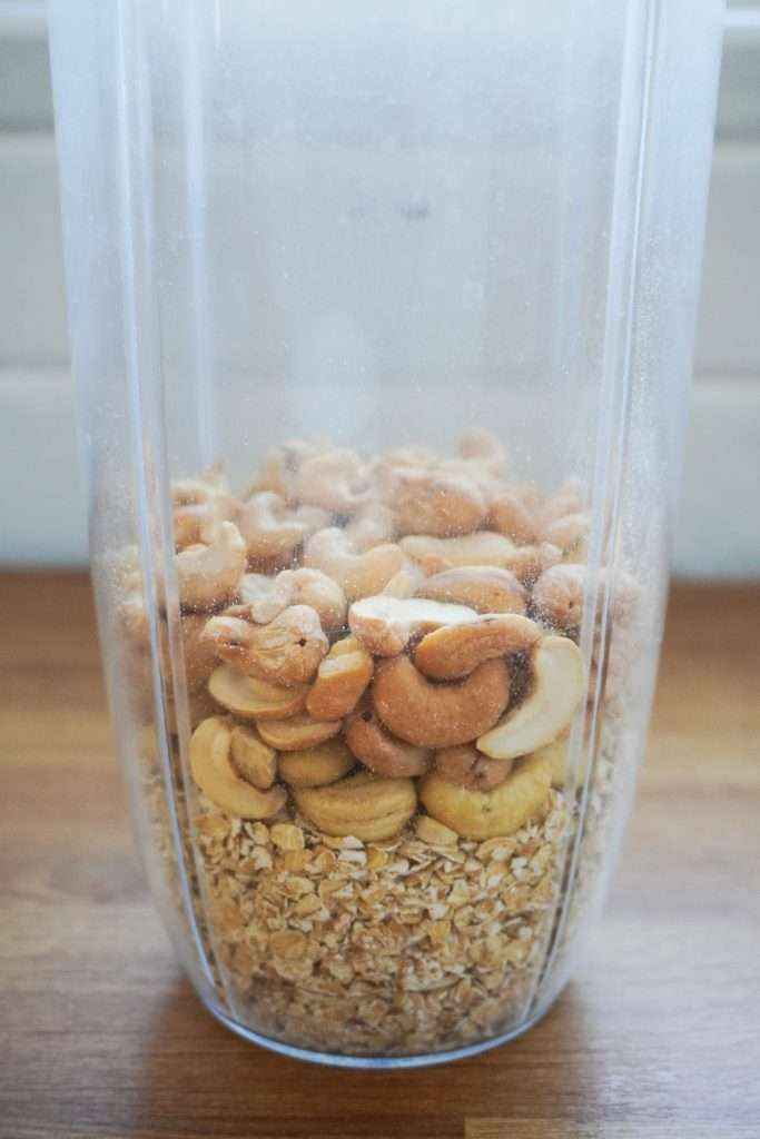 grind cashews and oats to make a crumbly flour